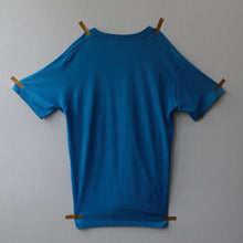 NIKE "JUST BURN IT, JUST SMASH IT, JUST MIX IT, JUST RISK IT, JUST SPIKE IT, JUST MOVE IT, JUST SOAK IT, JUST CLIMB IT, JUST SHOUT IT" T-SHIRT