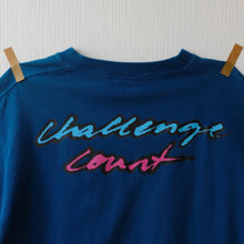NIKE "CHALLENGE COUNT" CROPPED T-SHIRT