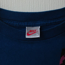 NIKE "CHALLENGE COUNT" CROPPED T-SHIRT