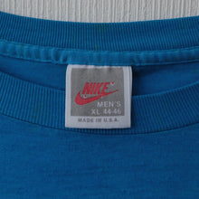 NIKE "JUST BURN IT, JUST SMASH IT, JUST MIX IT, JUST RISK IT, JUST SPIKE IT, JUST MOVE IT, JUST SOAK IT, JUST CLIMB IT, JUST SHOUT IT" T-SHIRT