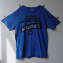 NIKE "EAT RIGHT. GET LOTS OF SLEEP. DRINK PLENTY OF FLUIDS. GO LIKE HELL" T-SHIRT