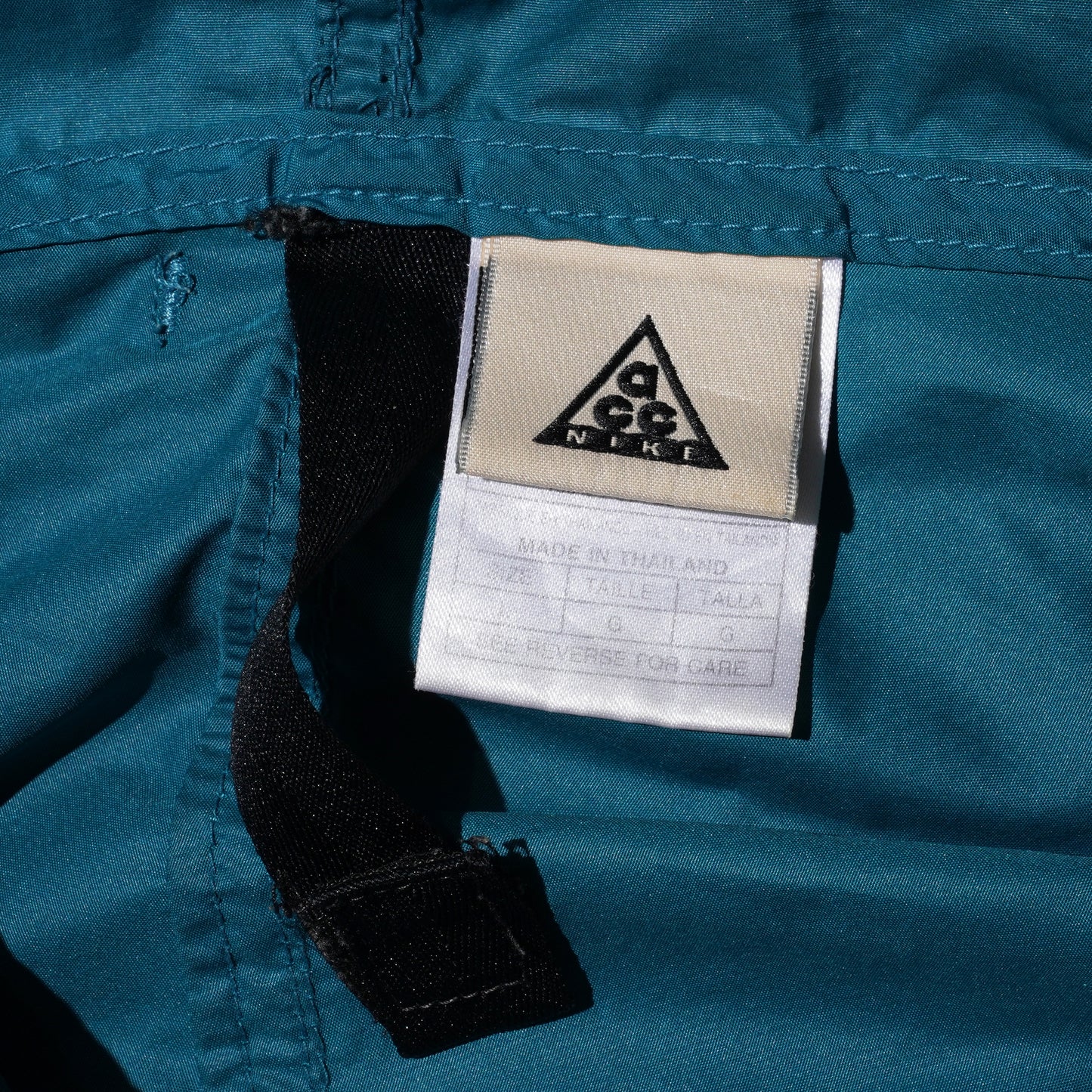 NIKE ACG MESH POCKET WINDBREAKER PULLOVER (TEAL)